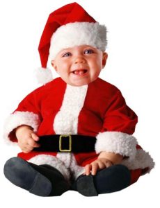 عکس زمینه سفید کودک با لباس بابانوئل در کریسمس